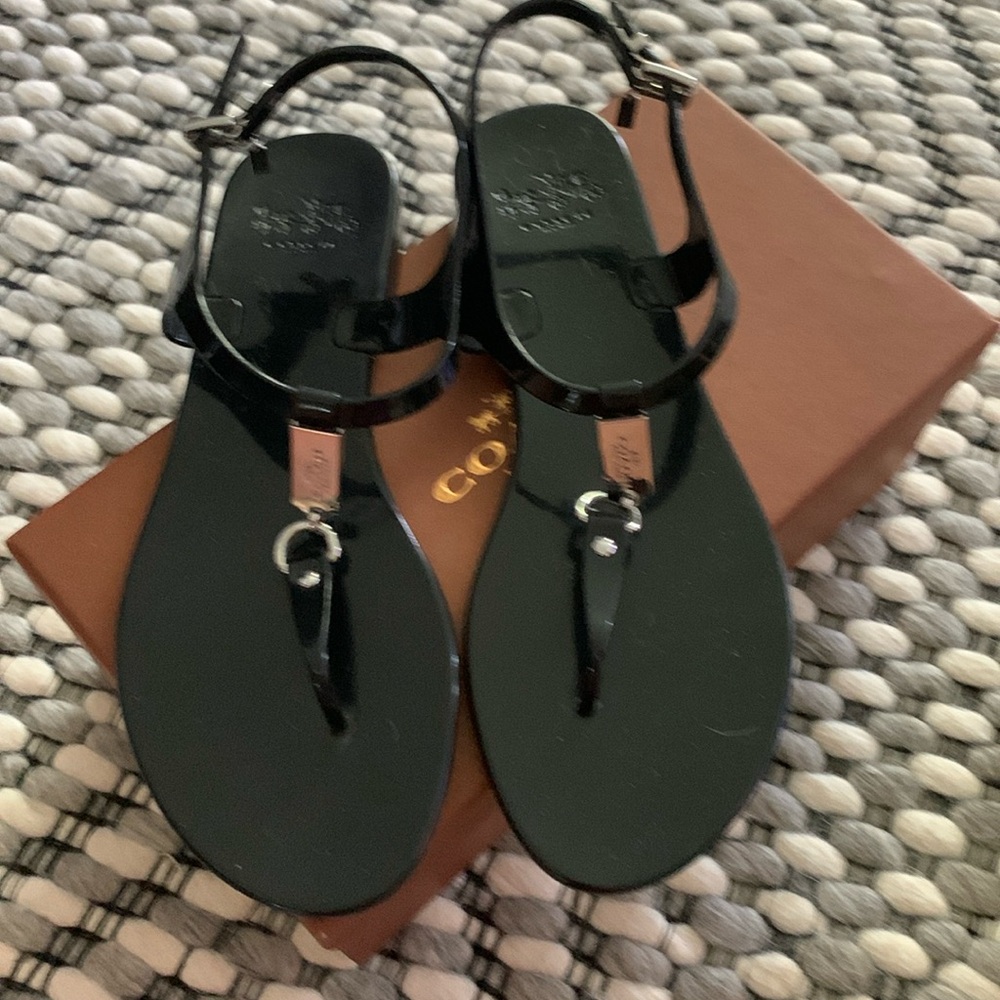 Like new coach patent sandals size 8 black. Great quality